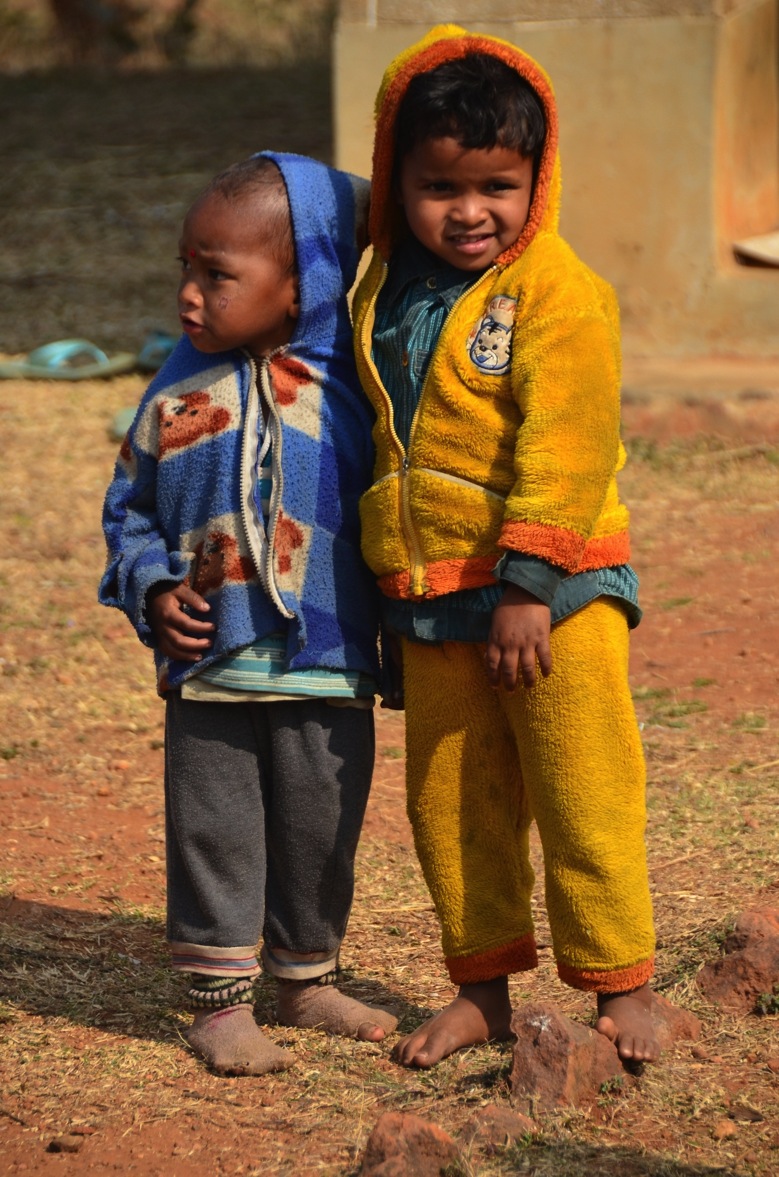 Winter support for students Two village school students wearing warm winter clothing