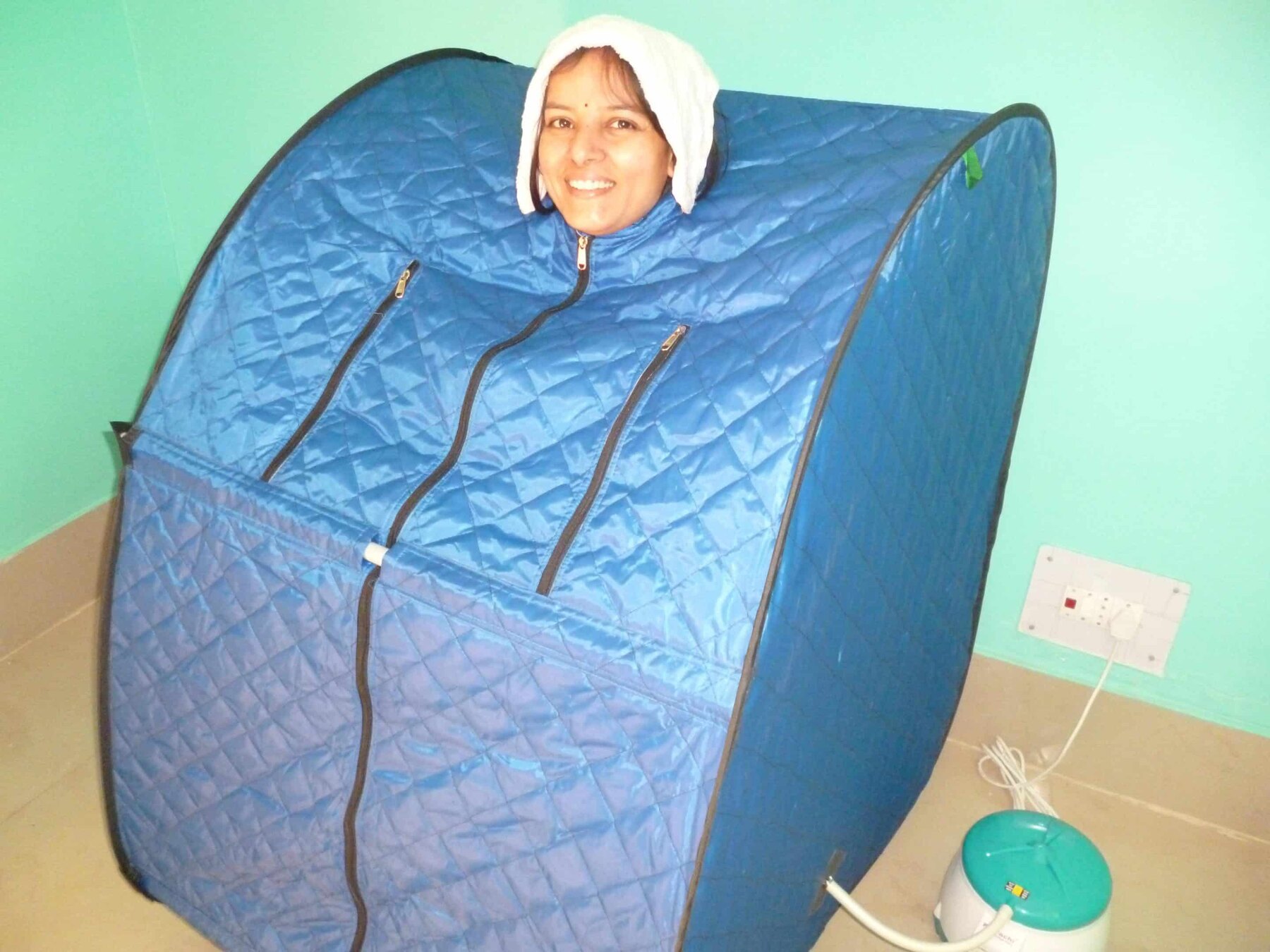 Supervised steam-bath therapy A guest receiving a supervised steam-bath treatment at the centre
